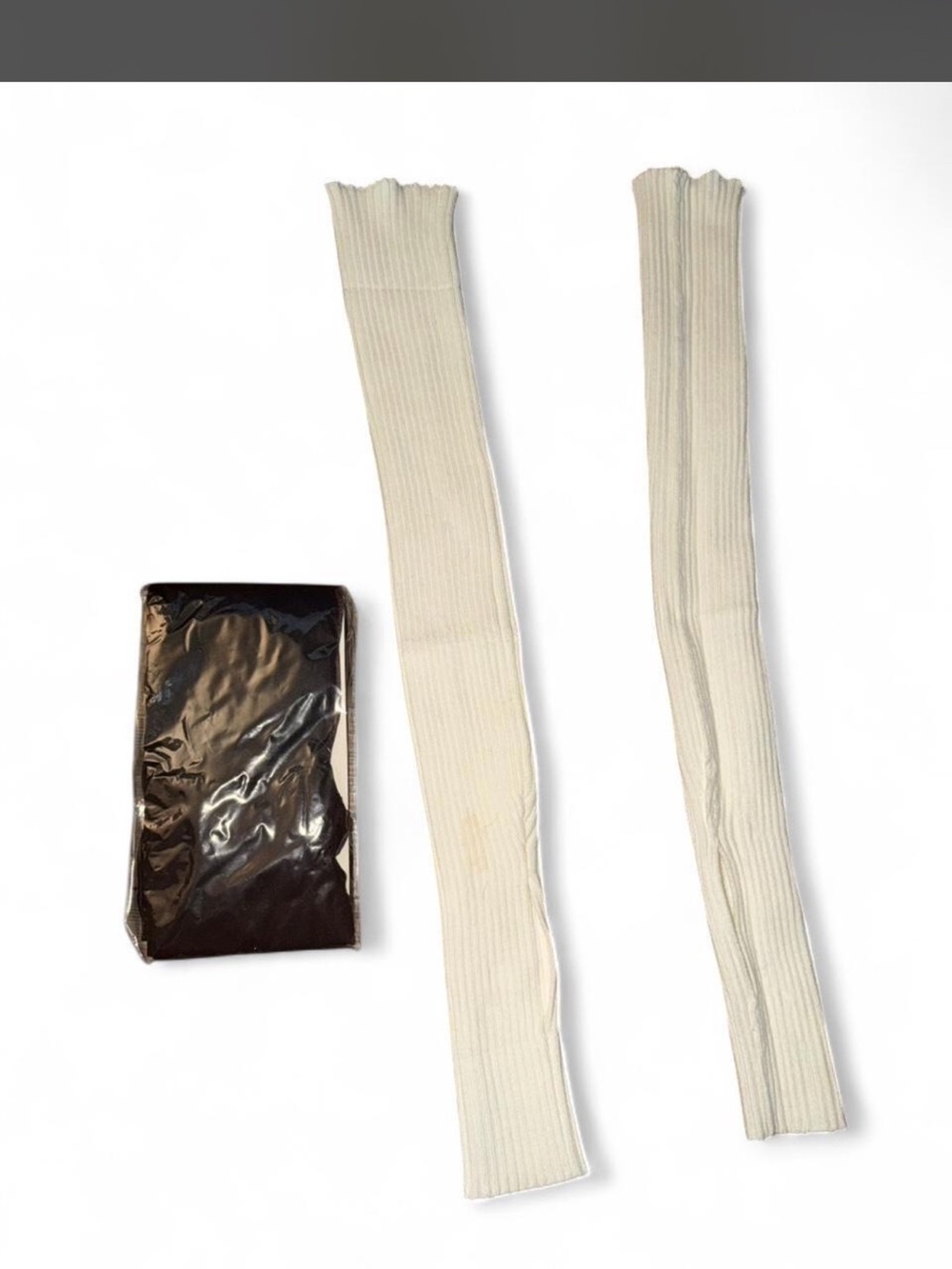 Women’s leg warmers and sheer brown pantyhose